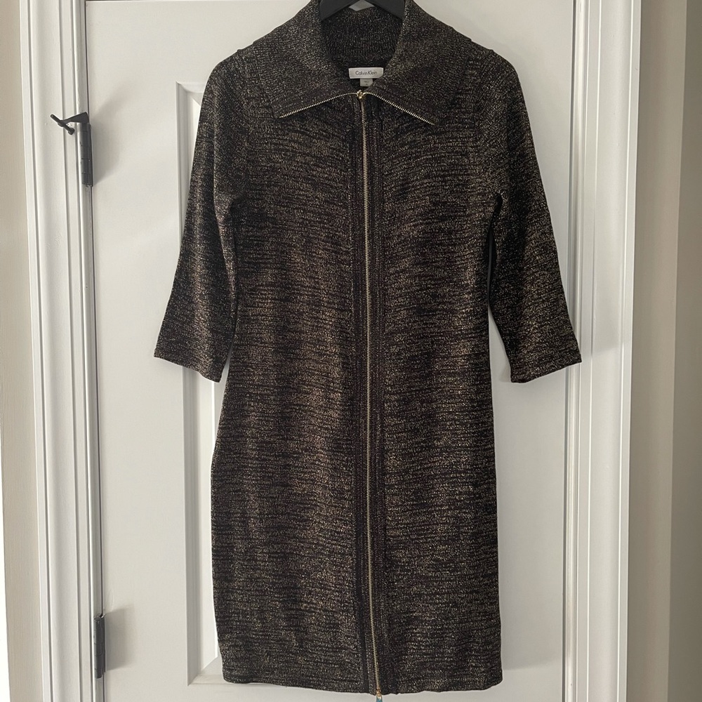 A beautiful Calvin Klein gold and black sweater dress
